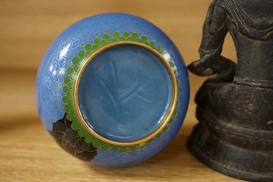 A Chinese blue cloisonné enamel vase and a Tibetan bronze of a Tara, tallest 17cm